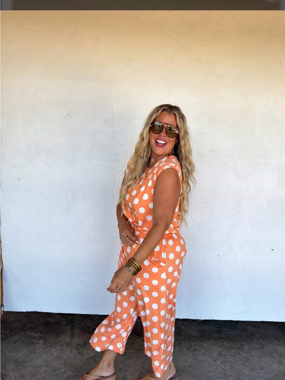 Sleeveless Orange Polka Dot Tie-Waist Jumpsuit